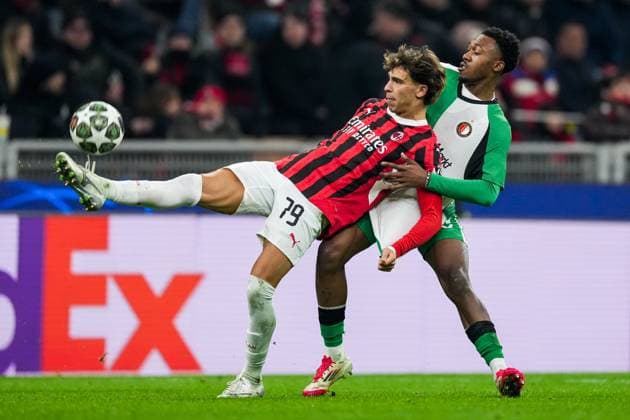 UEFA Champions League: AC Milan v Feyenoord Milan - Joao Felix of AC Milan, Antoni Milambo of Feyenoord during the 2nd leg of the knockout phase play-offs of new format of the Champions League 2024 2025. The match is set between AC Milan and Feyenoord at Giuseppe Meazza San Siro on 18 February 2025 in Milan, Italy. Copyright: xTomxBodex