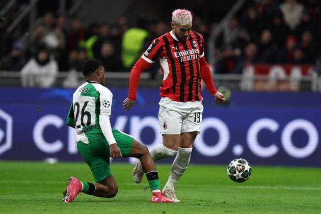 Givairo Read (Feyenoord) und Theo Hernandez (Ac Milan) battle for the ball, UEFA Champions League 2024 25 League Knockout Play-off Second Leg, AC Milan v Feyenoord, Stadio Giuseppe Meazza (San Siro), February 18, 2025, Milan, Italy.