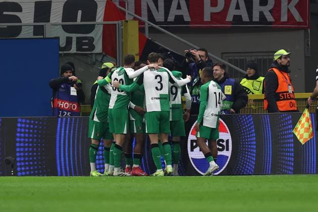 Julian Carranza (Feyenoord) celebrates after scoring his team s first goal with team mates, UEFA Champions League 2024 25 League Knockout Play-off Second Leg, AC Milan v Feyenoord, Stadio Giuseppe Meazza (San Siro), February 18, 2025, Milan, Italy.