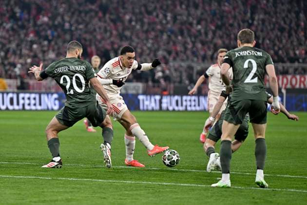 18 02 2025, Football UEFA Championsleague 2024 2025 Play off second leg, FC Bayern Munich Celtic Glasgow, at Allianz Arena Munich c l Cameron Carter Vickers Celtic Glasgow vs Jamal Musiala FC Bayern Munich DFL and DFB regulations prohibit any use of photographs as image sequences and or quasi video