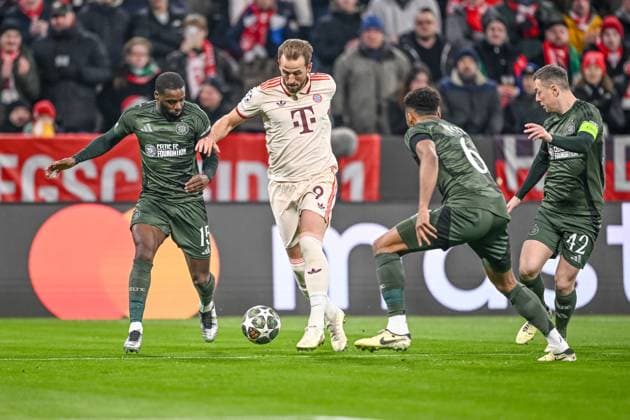 Jeffrey Schlupp Celtic FC , Harry Kane FC Bayern Muenchen , Auston Trusty Celtic FC and Callum McGregor Celtic FC battle for the ball during the UEFA Champions League 2024 25 League Knockout Play off Second Leg match between FC Bayern München and Celtic FC at Allianz Arena on February 18, 2025 in Munich, Germany Photo by Harry Langer DeFodi Images Defodi 541 FCBCFC0250218 05 Defodi-541