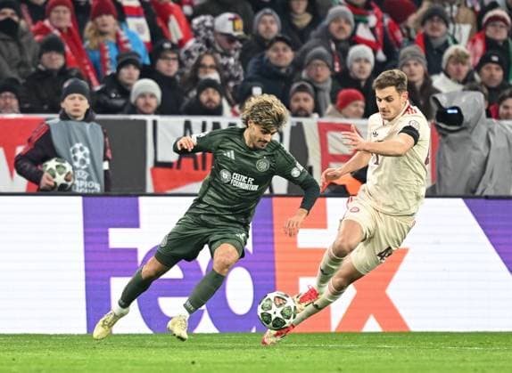 Jota of Celtic & Josip Stanisic of Bayern Munich. Bayern Munich v Celtic, UEFA Champions League, Knockout Round Play-offs, Second Leg, Football, Allianz Arena, Munich, Germany - 18 Feb 2025 Editorial use only  Copyright: xUlrichxGamel Shutterstockx 15156608aj