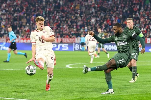 in duel, action, with Joshua Kimmich 6 FC Bayern Muenchen , Jeffrey Schlupp 15 Celtic Glasgow , FC Bayern Muenchen vs Celtic Glasgow, Football, Champions League, Play offs, second leg, 18 02 2025 Muenchen Bayern Germany Copyright: xkolbert-press ChristianxKolbertx