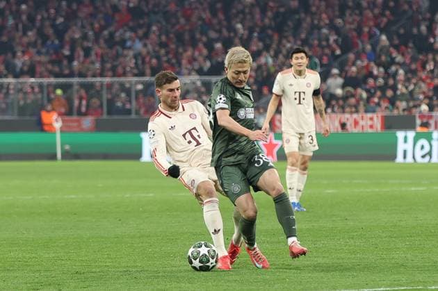 in duel, action, with Leon Goretzka 8 FC Bayern Muenchen , Daizen Maeda 38 Celtic Glasgow , FC Bayern Muenchen vs Celtic Glasgow, Football, Champions League, Play offs, second leg, 18 02 2025 Muenchen Bayern Germany Copyright: xkolbert-press ChristianxKolbertx