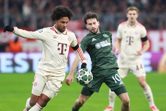 7 Serge Gnabry FCB vs Nicolas Kühn Celtic duel Football FC Bayern Munich Celtic Glasgow UEFA Champions League 18 02 2025 Allianz Arena PHOTO Mladen Lackovic LakoPress