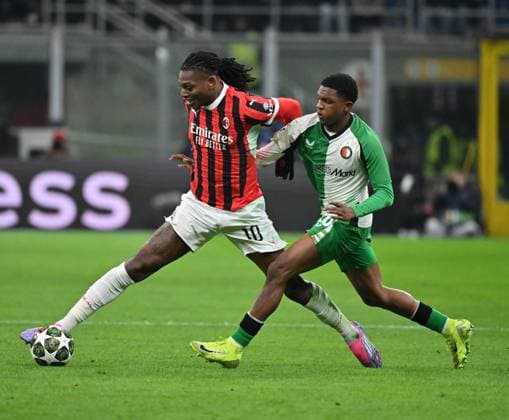 (250219) -- MILAN, Feb. 19, 2025 -- AC Milan s Rafael Leao (L) vies with Feyenoord s Givairo Read during the UEFA Champions League knockout phase play-off second leg football match between AC Milan and Feyenoord in Milan, Italy, Feb. 18, 2025. (Photo by Xinhua) (SP)ITALY-MILAN-FOOTBALL-UEFA CHAMPIONS LEAGUE-AC MILAN VS FEYENOORD AlbertoxLingria 
