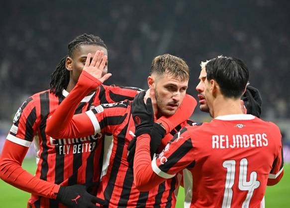 (250219) -- MILAN, Feb. 19, 2025 -- AC Milan s Santiago Gimenez (2nd L) celebrates his goal with his teammates during the UEFA Champions League knockout phase play-off second leg football match between AC Milan and Feyenoord in Milan, Italy, Feb. 18, 2025. (Photo by Xinhua) (SP)ITALY-MILAN-FOOTBALL-UEFA CHAMPIONS LEAGUE-AC MILAN VS FEYENOORD AlbertoxLingria 