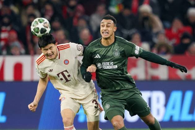 Bayerns 3 Min Jae KIM in a duel with Celtics 9 IDAH Football Bayern Celtic Football Champions League, FC Bayern München Celtic Glasgow FC 1 1, Play Off second leg, season 2024 2025, on 18 02 2025 in Munich, A L L I A N Z A R E N A, Germany Source Copyright Credit Oryk HAIST xFUSSBALL-BAYERN-CELTICx