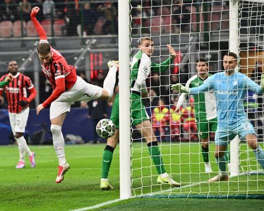 (250219) -- MILAN, Feb. 19, 2025 -- AC Milan s Santiago Gimenez (front L) scores during the UEFA Champions League knockout phase play-off second leg football match between AC Milan and Feyenoord in Milan, Italy, Feb. 18, 2025. (Photo by Xinhua) (SP)ITALY-MILAN-FOOTBALL-UEFA CHAMPIONS LEAGUE-AC MILAN VS FEYENOORD AlbertoxLingria 