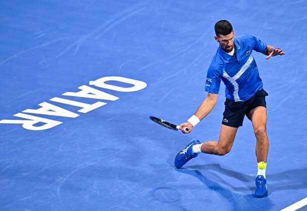 (250219) -- DOHA, Feb. 19, 2025 -- Novak Djokovic of Serbia hits a return during the men s singles round 32 match between Matteo Berrettini of Italy and Novak Djokovic of Serbia at the ATP, Tennis Herren Qatar Open tennis tournament in Doha, Qatar, on Feb. 18, 2025. (Photo by Xinhua) (SP)QATAR-DOHA-TENNIS-ATP QATAR OPEN 2025-MEN S SINGLES Nikku 