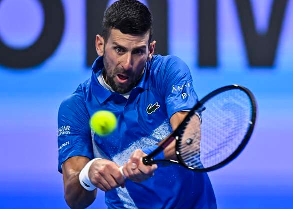 (250219) -- DOHA, Feb. 19, 2025 -- Novak Djokovic of Serbia hits a return during the men s singles round 32 match between Matteo Berrettini of Italy and Novak Djokovic of Serbia at the ATP, Tennis Herren Qatar Open tennis tournament in Doha, Qatar, on Feb. 18, 2025. (Photo by Xinhua) (SP)QATAR-DOHA-TENNIS-ATP QATAR OPEN 2025-MEN S SINGLES Nikku 