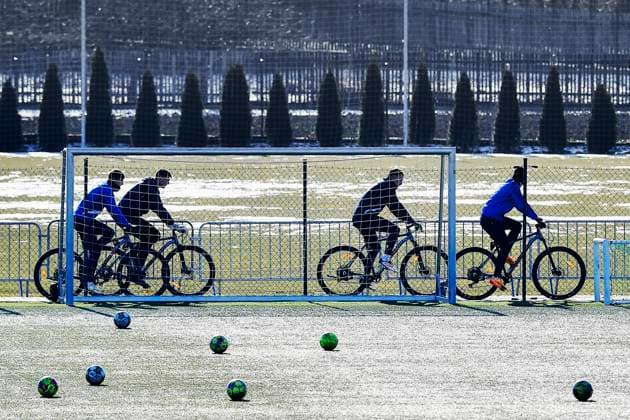 Plzen players ride by bikes to a training session within a media programme prior to the UEFA Europa League, 2nd round match: FC Viktoria Plzen vs Ferencvaros Budapest, in Pilsen, Czech Republic, on February 19, 2025. (CTKxPhoto MiroslavxChaloupka) CTKPhotoP2025021905440  CTKPhotoP2025021905440