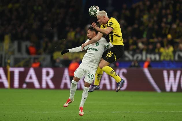 Dortmund on February 19, 2025 Uefa Champions League Knockout phase play offs, 2st leg Borussia Dortmund Sporting Clube de Portugal v l , Gabriel Teixeira Sporting Clube de Portugal , Julian Ryerson Borussia Dortmund , header, header duel Copyright: JoaquimxFerreira