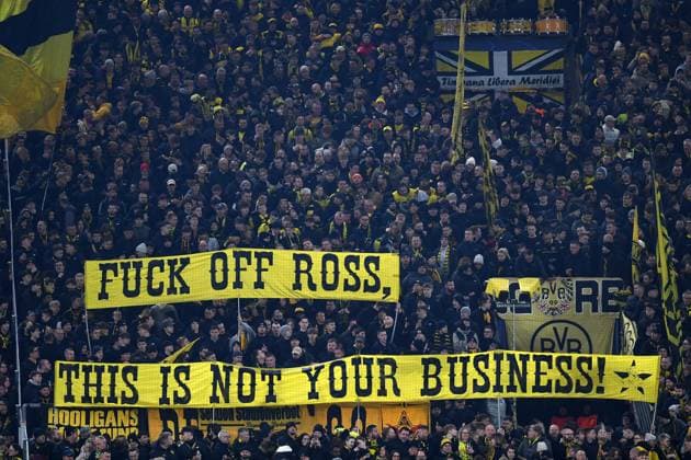Fans Dortmund with Banner Fuck off Ross, this is not your business during the UEFA Champions League 2024 25 League Play offs Second Leg match between Borussia Dortmund and Sporting Lisbon, SIGNAL IDUNA PARK on February 19, 2025 in Dortmund, Germany Photo by Ralf Treese DeFodi Images Fans Dortmund with Banner Fuck off Ross, this is not your business during the UEFA Champions League 2024 25 League Knockout Play off Second Leg match between Borussia Dortmund and Sporting Clube de Portugal at Signal Iduna Park on February 19, 2025 in Dortmund, Germany Photo by Ralf Treese DeFodi Images Defodi-521