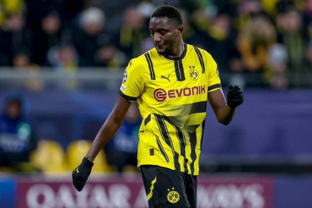 19 02 2025, Football, UEFA Champions League, Borussia Dortmund Sporting Lisbon, Signal Iduna Park, Knockout phase play offs, Season 2024 2025 Serhou Guirassy BVB 9 stands disappointed on the pitch after missing a penalty kick Disappointment North Rhine-Westphalia Germany