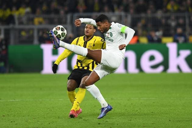 Julien Duranville Borussia Dortmund and Matheus Reis Sporting Lisbon in a duel during the UEFA Champions League 2024 25 Play offs Second Leg match between Borussia Dortmund and Sporting Lisbon, SIGNAL IDUNA PARK on February 19, 2025 in Dortmund, Germany, Germany Photo by Ralf Treese DeFodi Images Julien Duranville Borussia Dortmund and Matheus Reis Sporting Lisbon battle for the ball during the UEFA Champions League 2024 25 League Knockout Play off Second Leg match between Borussia Dortmund and Sporting Clube de Portugal at Signal Iduna Park on February 19, 2025 in Dortmund, Germany Photo by Ralf Treese DeFodi Images Defodi-521