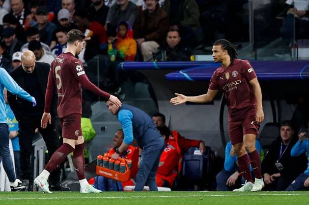 John Stones of Manchester City leaves the pitch with an injury early in the game Real Madrid v Manchester City, UEFA Champions League, Knockout Round Play-offs, Second Leg, Football, Santiago BernaboÆ?Ã?Æ?o Ã? u, Madrid, Spain - 19 Feb 2025 EDITORIAL USE ONLY No use with unauthorised audio, video, data, fixture lists, club league logos or live services. Online in-match use limited to 120 images, no video emulation. No use in betting, games or single club league player publications. Copyright: xRubenxAlbarran Shutterstockx 15137179l