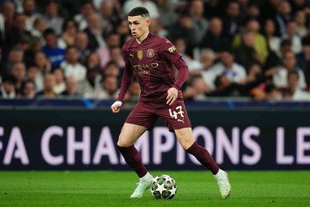 ESP: Real Madrid v Manchester City. UEFA Champions League match. Play off round Phil Foden of Manchester City during the UEFA Champions League match, play off round, second leg, between Real Madrid and Manchester City played at Santiago Bernabeu Stadium on Feb 19, 2025 in Madrid Spain. kpng Copyright: xBaguxBlancox xPRESSINPHOTOx PS_250219_RMA_MCI_018