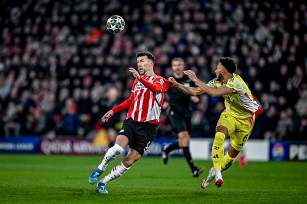 PSV midfielder Ivan Perisic , Juventus defender Lloyd Kelly, during the match PSV Juventus at the Philips stadium for the UEFA Champions League Knockout phase play offs 2nd leg season 2024 2025 in EINDHOVEN, Netherlands on 19 february 2025, photo by Stefan Koops EYE4images DeFodi Images Defodi-746