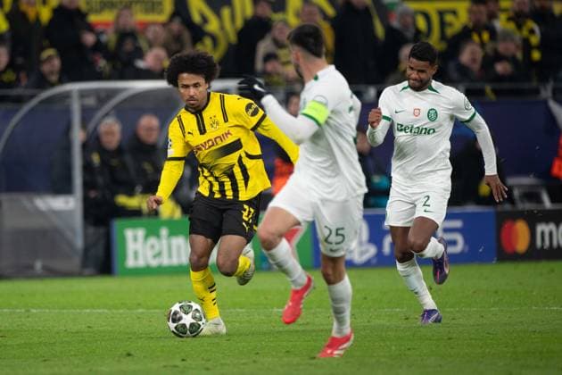 Karim David ADEYEMI DO vs Goncalo INACIO Sporting and Matheus REIS Sporting action, duel, football Champions League, play offs, Borussia Dortmund DO Sporting Lisbon CP Sporting 0 0 on 19 02 2025 in Dortmund Germany UEFA regulations prohibit any use of photographs as image sequences and or quasi video Â