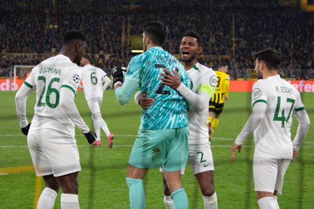 Goalkeeper Rui SILVA Sporting saves a penalty from Serhou GUIRASSY DO and is celebrated by Ousmane DIOMANDE Sporting , Matheus REIS Sporting and Ricardo ESGAIO Sporting , Football Champions League, Play offs, Borussia Dortmund DO Sporting Lisbon CP Sporting 0 0 on 19 02 2025 in Dortmund Germany UEFA regulations prohibit any use of photographs as image sequences and or quasi video Â