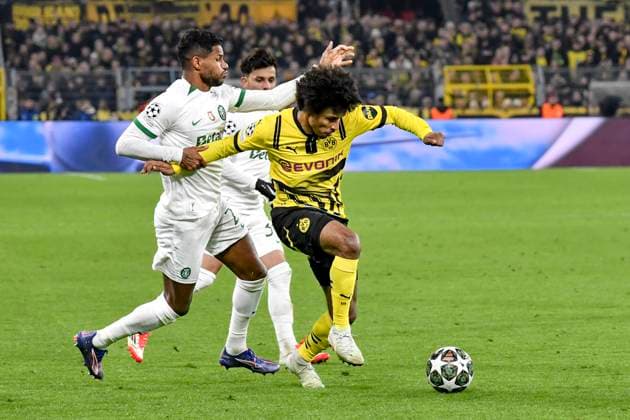 v li in duel Matheus Reis Sporting 2 Karim Adeyemi Dortmund 27 19 02 2025 Soccer, Champions League, Borussia Dortmund vs Sporting CP, Signal Iduna Park, Dortmund, Copyright: xpepphotox xHorstxMauelshagenx pep00321, pep_20250219_hm_5105