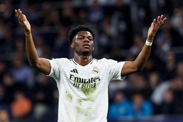 Aurà lien Tchouamà ni of Real Madrid appeals Real Madrid v Manchester City, UEFA Champions League, Knockout Round Play-offs, Second Leg, Football, Santiago BernaboÆ?Ã?Æ?o Ã? u, Madrid, Spain - 19 Feb 2025 EDITORIAL USE ONLY No use with unauthorised audio, video, data, fixture lists, club league logos or live services. Online in-match use limited to 120 images, no video emulation. No use in betting, games or single club league player publications. Copyright: xRubenxAlbarran Shutterstockx 15137179aj