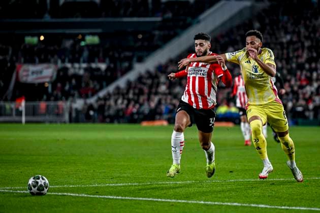 PSV midfielder Ismael Saibari, Juventus defender Lloyd Kelly, during the match PSV Juventus at the Philips stadium for the UEFA Champions League Knockout phase play offs 2nd leg season 2024 2025 in EINDHOVEN, Netherlands on 19 february 2025, photo by Stefan Koops EYE4images DeFodi Images Defodi-746