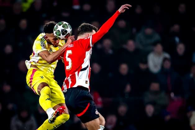 Juventus defender Lloyd Kelly, PSV Eindhoven forwarder Ivan Perisic during the match PSV Juventus at the Philips stadium for the UEFA Champions League Knockout phase play offs 2nd leg season 2024 2025 in EINDHOVEN, Netherlands on 19 february 2025, photo by Marcel van Dorst EYE4images DeFodi Images Defodi-746