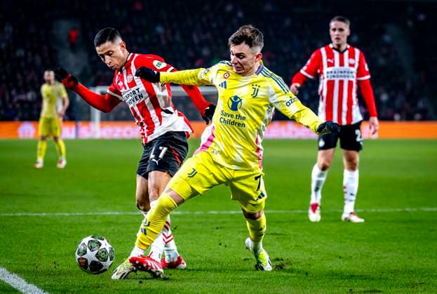 PSV Eindhoven defender Mauro Junior, Juventus forwarder Franscisco Conceicao during the match PSV Juventus at the Philips stadium for the UEFA Champions League Knockout phase play offs 2nd leg season 2024 2025 in EINDHOVEN, Netherlands on 19 february 2025, photo by Marcel van Dorst EYE4images DeFodi Images Defodi-746