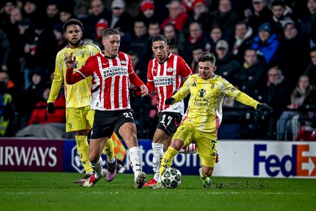 PSV midfielder Joey Veerman, Juventus forwarder Franscisco Conceicao, during the match PSV - Juventus at the Philips stadium for the UEFA Champions League - Knockout phase play-offs - 2nd leg season 2024-2025 in EINDHOVEN, Netherlands on 19 february 2025, (photo by Stefan Koops EYE4images DeFodi Images) Defodi-746