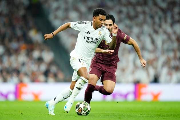 Real Madrid C.F. v Manchester City - UEFA Champions League 2024 25 League Knockout Play-off Second Leg Rodrygo Goes right winger of Real Madrid and Brazil during the UEFA Champions League 2024 25 League Knockout Play-off second leg match between Real Madrid C.F. and Manchester City at on February 19, 2025 in Madrid, Spain. Madrid Spain  Copyright: xJosexBretonx originalFilename:bretonhernandez-realmadr250219_npCO0.jpg