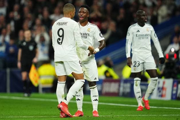 ESP: Real Madrid v Manchester City. UEFA Champions League match. Play off round Kylian Mbappe and Vinicius Junior of Real Madrid during the UEFA Champions League match, play off round, second leg, between Real Madrid and Manchester City played at Santiago Bernabeu Stadium on Feb 19, 2025 in Madrid Spain. kpng Copyright: xBaguxBlancox xPRESSINPHOTOx PS_250219_RMA_MCI_046