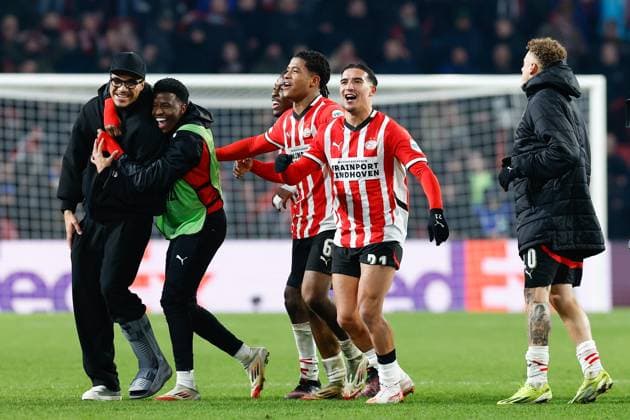 EINDHOVEN, 19-02-2025, Philips Stadium, UEFA Champions League season 2024 25, match between PSV and Juventus, PSV player Ryan Flamingo, PSV player Couhaib Driouech, PSV player Noa Lang celebrating the 3-1 win PSV - Juventus  x27945551x Copyright: