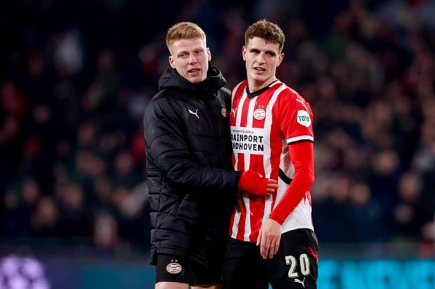 2025-02-19 PSV v Juventus - UEFA Champions League 2024 25 League Knockout Play-off Second Leg EINDHOVEN, NETHERLANDS - FEBRUARY 19: Jerdy Schouten of PSV and Guus Til of PSV celebrate the win during the UEFA Champions League 2024 25 League Knockout Play-off Second Leg match between PSV and Juventus at Philips Stadion on February 19, 2025 in Eindhoven, Netherlands. Eindhoven Philips Stadion Netherlands Content not available for redistribution in The Netherlands directly or indirectly through any third parties. Copyright: xBroerxvanxdenxBoomx