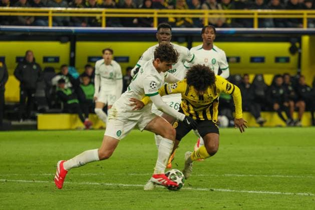 Dortmund, Germany February 19, 2025 Champions League 2024 2025 Borussia Dortmund vs Sporting Lisbon In the picture from left in the duel Eduardo Quaresma Sporting Lisbon and Karim Adeymi BVB Signal Iduna Park North Rhine-Westphalia Copyright: xFotostandx xFantinix