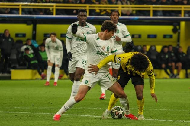 Dortmund, Germany February 19, 2025 Champions League 2024 2025 Borussia Dortmund vs Sporting Lisbon In the picture from left in the duel Eduardo Quaresma Sporting Lisbon and Karim Adeymi BVB Signal Iduna Park North Rhine-Westphalia Copyright: xFotostandx xFantinix