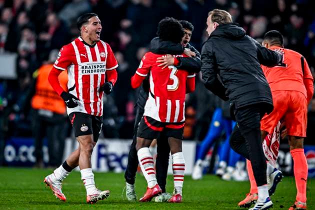 PSV forwarder Couhaib Driouech, PSV defender Tyrell Malacia celebrating the win 3 1, during the match PSV Juventus at the Philips stadium for the UEFA Champions League Knockout phase play offs 2nd leg season 2024 2025 in EINDHOVEN, Netherlands on 19 february 2025, photo by Stefan Koops EYE4images DeFodi Images Defodi-746