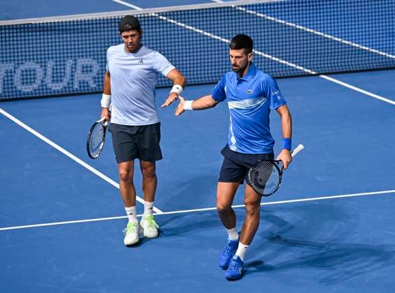ATP, Tennis Herren QATAR EXXONMOBIL OPEN MEN S DOUBLES QUARTERFINAL Fernando Verdasco of Spain (R) and Novak Djokovic of Serbia interact during their Men s doubles quarterfinal match against Harri Heliovaara of Finland and Henry Patten of Great Britain at the ATP Qatar ExxonMobil Open 2025 tennis tournament at the Khalifa International Tennis Complex in Doha, Qatar, on February 19, 2025. DOHA Qatar Copyright: xNOUSHADx
