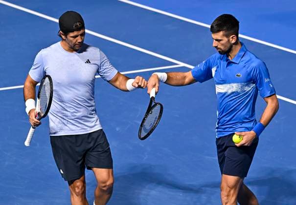 ATP, Tennis Herren QATAR EXXONMOBIL OPEN MEN S DOUBLES QUARTERFINAL Fernando Verdasco of Spain (R) and Novak Djokovic of Serbia interact during their Men s doubles quarterfinal match against Harri Heliovaara of Finland and Henry Patten of Great Britain at the ATP Qatar ExxonMobil Open 2025 tennis tournament at the Khalifa International Tennis Complex in Doha, Qatar, on February 19, 2025. DOHA Qatar Copyright: xNOUSHADx