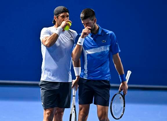 ATP, Tennis Herren QATAR EXXONMOBIL OPEN MEN S DOUBLES QUARTERFINAL Fernando Verdasco of Spain (R) and Novak Djokovic of Serbia interact during their Men s doubles quarterfinal match against Harri Heliovaara of Finland and Henry Patten of Great Britain at the ATP Qatar ExxonMobil Open 2025 tennis tournament at the Khalifa International Tennis Complex in Doha, Qatar, on February 19, 2025. DOHA Qatar Copyright: xNOUSHADx