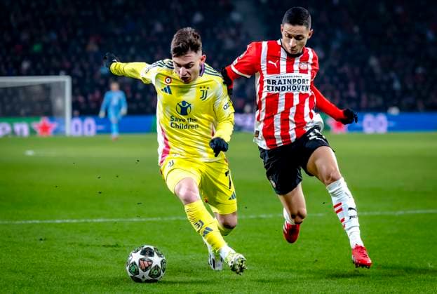 Juventus forwarder Franscisco Conceicao, PSV Eindhoven defender Mauro Junior during the match PSV Juventus at the Philips stadium for the UEFA Champions League Knockout phase play offs 2nd leg season 2024 2025 in EINDHOVEN, Netherlands on 19 february 2025, photo by Marcel van Dorst EYE4images DeFodi Images Defodi-746