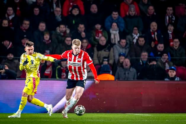 Juventus forwarder Franscisco Conceicao, PSV Eindhoven midfielder Jerdy Schouten during the match PSV Juventus at the Philips stadium for the UEFA Champions League Knockout phase play offs 2nd leg season 2024 2025 in EINDHOVEN, Netherlands on 19 february 2025, photo by Marcel van Dorst EYE4images DeFodi Images Defodi-746