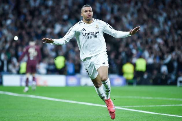 (250220) -- MADRID, Feb. 20, 2025 -- Kylian Mbappe of Real Madrid celebrates a goal during the UEFA Champions League knockout phase play-off second leg football match between Real Madrid and Manchester City in Madrid, Spain, on Feb. 19, 2025. (Photo by Xinhua) (SP)SPAIN-MADRID-FOOTBALL-UEFA CHAMPIONS LEAGUE-REAL MADRID VS MANCHESTER CITY GustavoxValiente 