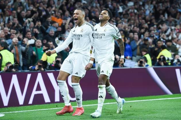 (250220) -- MADRID, Feb. 20, 2025 -- Kylian Mbappe (L) and Rodrygo of Real Madrid celebrate a goal during the UEFA Champions League knockout phase play-off second leg football match between Real Madrid and Manchester City in Madrid, Spain, on Feb. 19, 2025. (Photo by Xinhua) (SP)SPAIN-MADRID-FOOTBALL-UEFA CHAMPIONS LEAGUE-REAL MADRID VS MANCHESTER CITY GustavoxValiente 