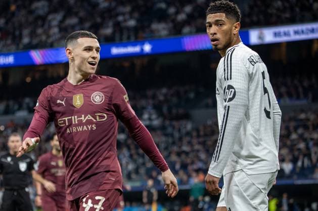 UCL Real Madrid Vs Manchester City in Madrid, Spain - 19 Feb 2025 Manchester City s Phil Foden (L) and Real Madrid s Jude Bellingham (R) seen in action during the UEFA Champions League play-off second leg match between Real Madrid and Manchester City at the Santiago Bernabéu stadium. Final result: Real Madrid 3:1 Manchester City Madrid Spain Copyright: xDavidxCanalesx xSOPAxImagesx DCUCLRMMCITY250219-11