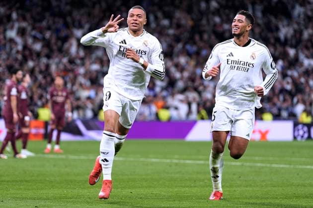 MBAPPE Kylian Team Real Madrid cheers after his third goal with BELLINGHAM Jude UEFA Champions League season 2024 2025 match Real Madrid Manchester City 3 1 on 19 02 2025 in Madrid DFL REGULATIONS PROHIBIT ANY USE OF PHOTOGRAPHS as IMAGE SEQUENCES and or QUASI VIDEO Copyright: xLacixPerenyix