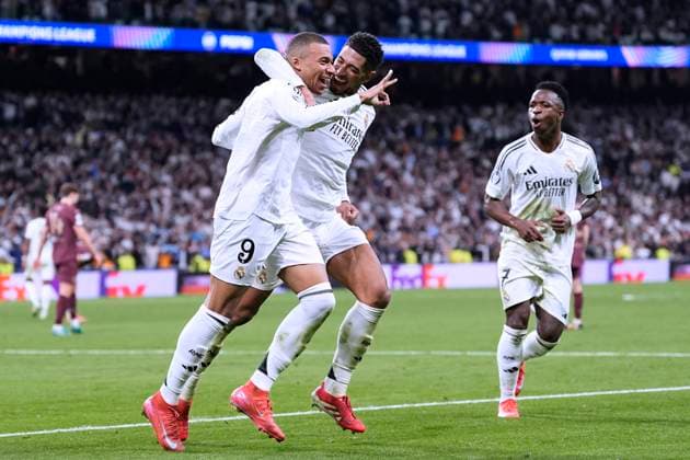 MBAPPE Kylian Team Real Madrid cheers after his third goal with BELLINGHAM Jude UEFA Champions League season 2024 2025 match Real Madrid Manchester City 3 1 on 19 02 2025 in Madrid DFL REGULATIONS PROHIBIT ANY USE OF PHOTOGRAPHS as IMAGE SEQUENCES and or QUASI VIDEO Copyright: xLacixPerenyix