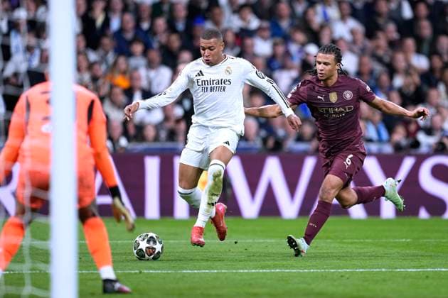 MBAPPE Kylian Team Real Madrid with AKE UEFA Champions League Season 2024 2025 Match Real Madrid Manchester City 3 1 on 19 02 2025 in Madrid DFL REGULATIONS PROHIBIT ANY USE OF PHOTOGRAPHS as IMAGE SEQUENCES and or QUASI VIDEO Copyright: xLacixPerenyix