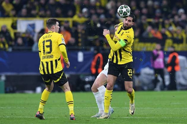 Soccer Champions League Play off Borussia Dortmund Sporting Lisbon on 19 02 2025 at Signal Iduna Park in Dortmund Pascal Groß Dortmund , left Emre Can Dortmund , right Conrad Harder Lisbon , back xRx